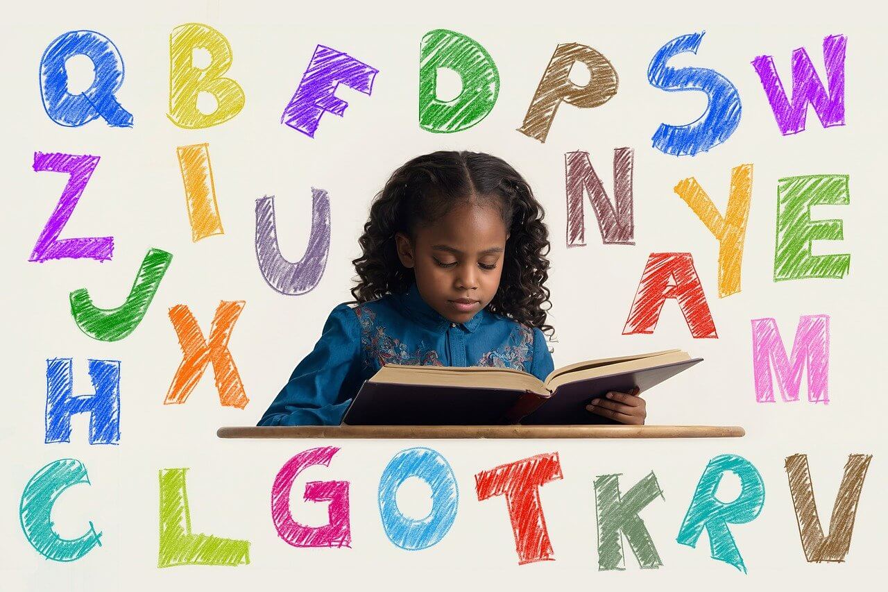 Girl reading with letters on the Wall