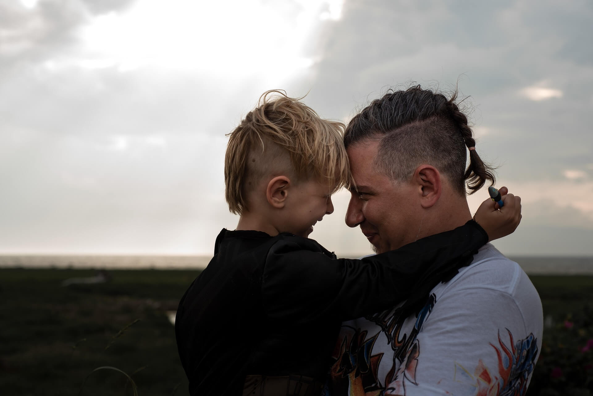 Dad and Son's Foreheads Touching