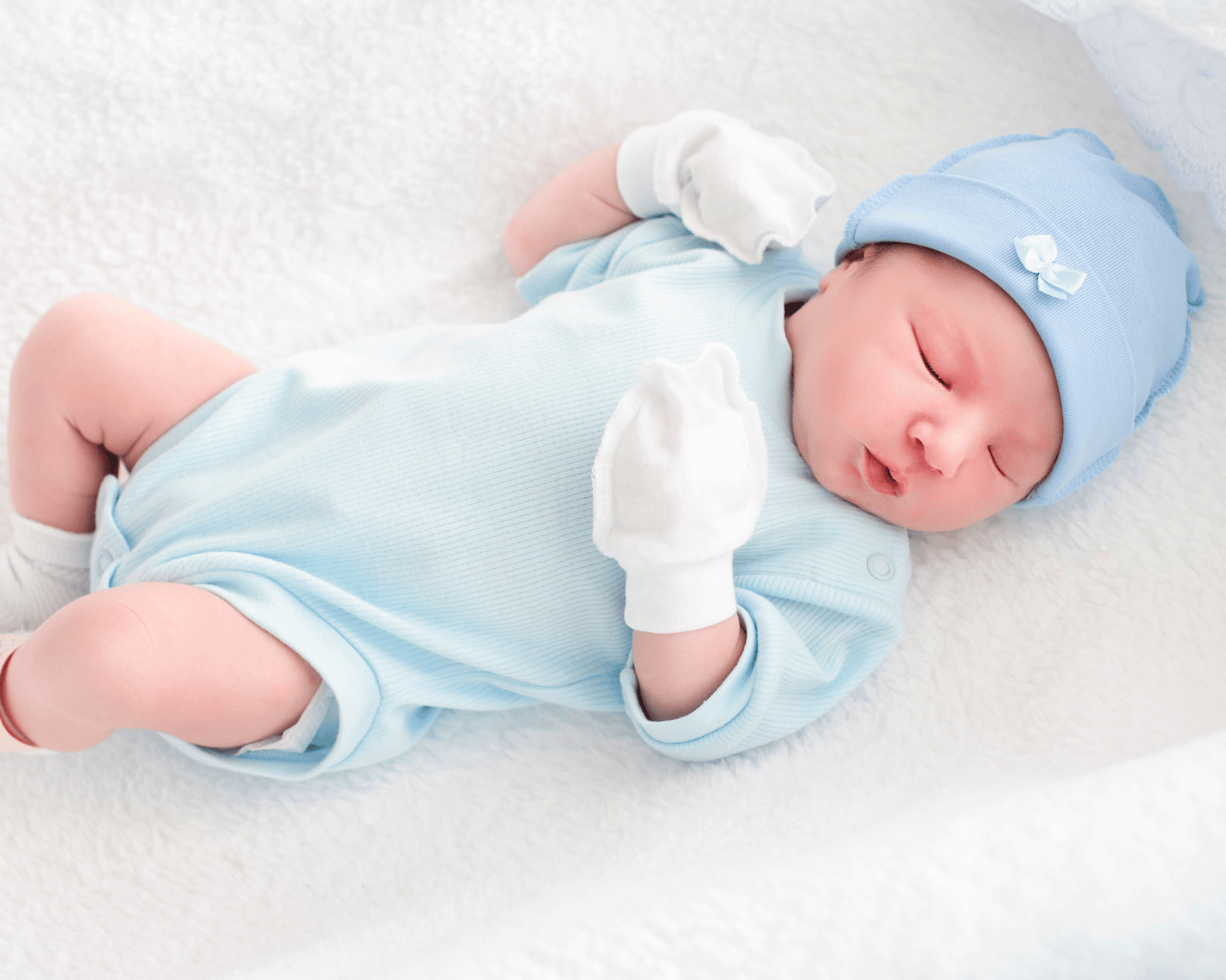 Infant boy in crib.